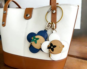 Dije de flor de cuero hecho a mano para monedero, llavero con minibolsito con cremallera, regalo de lujo para ella, dije de cuero para bolso, regalo de cumpleaños