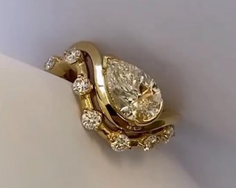 Zestaw obrączek ślubnych East West w szlifie gruszkowym 1CT z pasującą falą i dystansem, unikatowy zestaw obrączek ślubnych ze złota 14k, na rocznicę ślubu