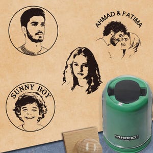 May include: A collection of custom portrait stamps with a green stamp holder. The stamps feature line art portraits of individuals and couples, with names like "AHMAD & FATIMA" and "SUNNY BOY" encircling the images. The stamp holder is green with the brand name "YIHONG".