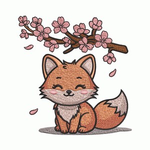 May include: An embroidered design featuring a cartoon fox with a smiling face, positioned under a branch of pink cherry blossoms. The fox is orange and white with a fluffy tail. Pink petals are falling.