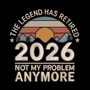 May include: Black graphic design with the text "THE LEGEND HAS RETIRED 2026 NOT MY PROBLEM ANYMORE." The design features a sunset scene with mountains and a sun in shades of orange, blue, and beige.