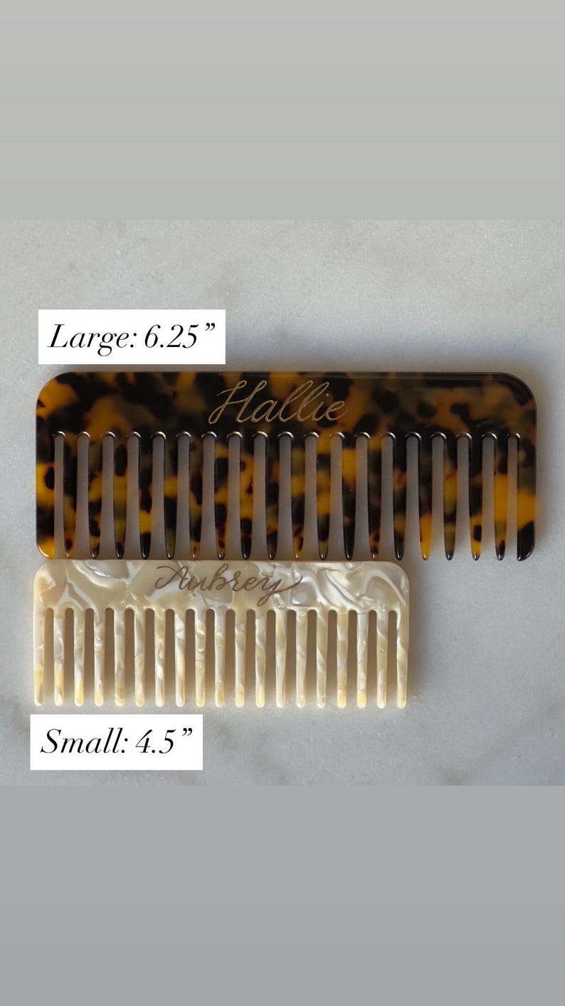 May include: Two personalised combs are shown. The larger comb, 16 cm, has a tortoiseshell pattern and the name "Hallie" in script. The smaller comb, 11.4 cm, is white with the name "Aubrey" in script.