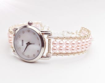 Reloj de pulsera para mujer hecho a mano con cuentas de alambre y perlas rosas - Relojes plateados