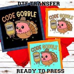 May include: DTF transfer designs featuring a cartoon turkey wearing a hat and holding a gravy bag. The text "CODE GOBBLE" is above the turkey. The text "READY TO PRESS" is below the designs.