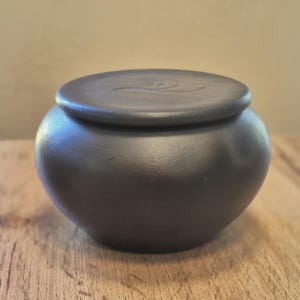 Maceta de cerámica negra hecha a mano, alfarero nórdico sin esmaltar, cerámica esmaltada, caracol.
