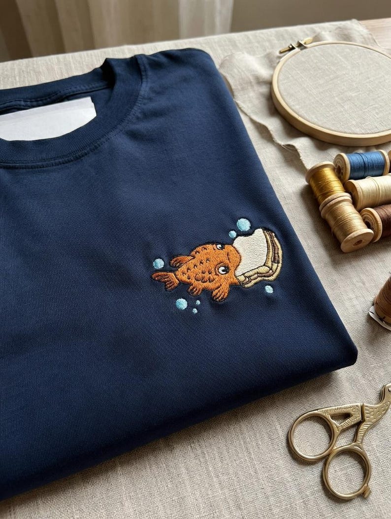 Embroidered Disney Lilo and Stitch Pudge Shirt, Disney Fish Pudge Controls The Weather T-shirt, Disneyland Family Matching Shirt for Gifts image 2