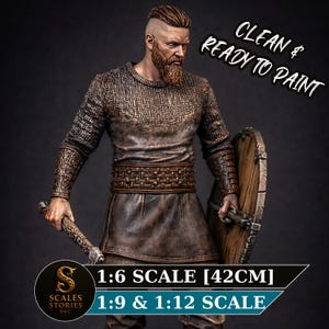 May include: A detailed figure of a Viking warrior, holding a weapon and shield. The figure is dressed in brown leather and chainmail-like armor. The text "CLEAN & READY TO PAINT" is visible. The figure is 1:6 scale, approximately 16.5 inches tall.