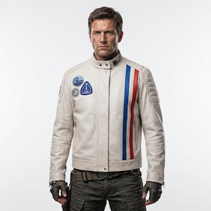 May include: Cream-colored leather jacket with a stand-up collar and vertical red, white, and blue stripes. The jacket features multiple patches on the chest and quilted shoulder detailing. The model is wearing dark green cargo pants and gloves.