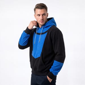 May include: A set of three ceramic mugs with a speckled, matte finish. The mugs are in shades of cream, light gray, and dark gray. Each mug has a simple, minimalist design, perfect for coffee or tea.