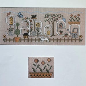 May include: A white ceramic mug with a black handle and the text "But First, Coffee" in a black, handwritten-style font. The mug is on a white surface.