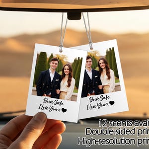 May include: Two white car air fresheners with a photo of a couple, the text "Drive Safe I Love You x" and a black heart. The bottom right corner of the image has the text "12 scents available, Double-sided printing, High-resolution printing."