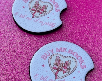 Juego de 2 rotuladores para coche con el mensaje "Cómprame libros y dime que soy guapa"