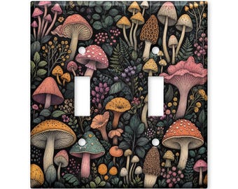 May include: A rectangular double light switch cover plate featuring a dense, colourful botanical pattern of various mushrooms, berries, and foliage against a black background. The design includes pink, orange, yellow, and teal fungi illustrations.