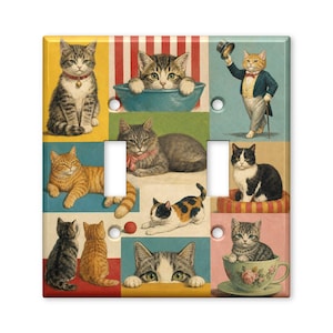 May include: A square light switch cover plate featuring a collage of various cats in different poses and settings, including a cat in a teacup, a cat wearing a tuxedo, and several kittens, all rendered in a colorful, illustrative art style.