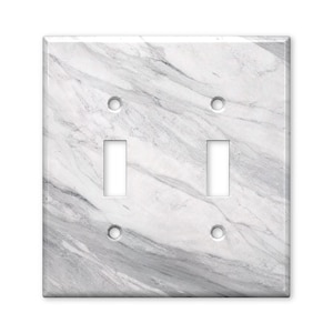 May include: A double toggle light switch wall plate featuring a white and gray marble pattern with diagonal veining. The rectangular cover includes two vertical rectangular cutouts for switches and four circular screw holes for mounting.