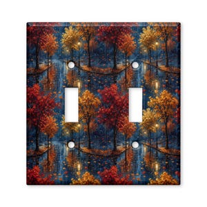 May include: A double light switch wall plate featuring a repeating pattern of an autumn park scene at night. The design displays trees with vibrant red and yellow leaves, glowing street lamps, and reflections on a wet ground surface.