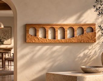 May include: A rectangular wooden wall art piece featuring a series of seven carved arches. The lower portion of the panel has a textured, uneven surface, while the upper section displays open archways with a smooth, light-colored background.