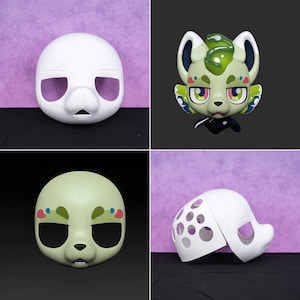 Op de afbeelding: Een verzameling van vier verschillende maskers. De maskers omvatten een wit, leeg masker, een groen en wit cartoonkaraktermasker, een lichtgroen masker met zwarte ooggaten en een wit masker met gaten en een gespleten ontwerp.