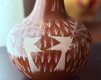 Vintage Mexican folk art vase. Burnished red clay with etched pattern.
