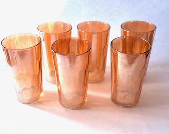 Vintage Jeannete Marigold swirl glasses in iridescent peach color.