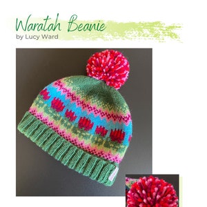 Op de afbeelding: Een groene gebreide beanie met een roze en rode pompon bovenop. De beanie heeft een kleurrijk patroon van rode bloemen, groene bladeren en blauwe en roze strepen. De beanie is gelabeld "Waratah Beanie by Lucy Ward".