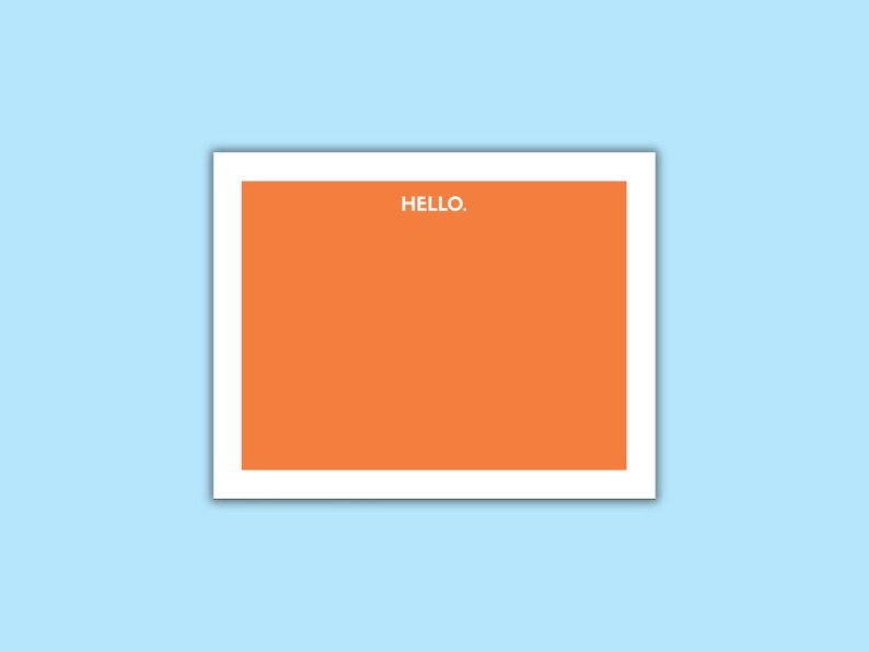 May include: A rectangular orange card with a white border. The word HELLO. is printed in white, sans-serif capital letters at the top center of the orange field. The card is presented against a solid light blue background.