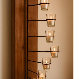 Rustic Metal Wall Tealight Candle Holder with 7 Swivel Arms and Glass Cups