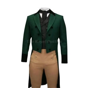 May include: A green tailcoat with black velvet lapels and cuffs, worn with a black waistcoat and tan trousers. The outfit has a double-breasted design and is suitable for formal events. The text "The Royal Outfits" is visible.
