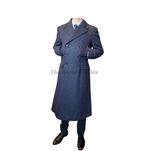 May include: A long, double-breasted navy blue coat with a classic design. The coat features a notched lapel, two rows of buttons, and pockets. The coat is approximately 55 inches long.