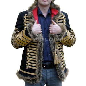 May include: Black jacket with gold embroidery and trim, featuring a faux fur collar and cuffs. The jacket has multiple gold buttons and horizontal gold stripes. The text "THE ROYAL OUTFITS" is visible on the jacket.