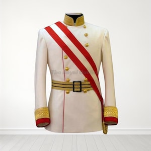 May include: A white military-style jacket with gold buttons, trim, and a black collar. A red and white sash crosses the chest, and a gold and black belt with a black buckle cinches the waist. The cuffs are red with gold trim. The text "The Royal Custom" is visible.