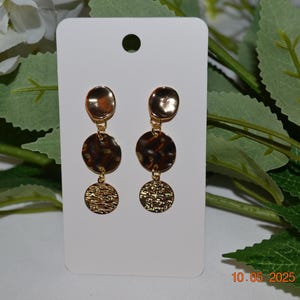 Gold tone dangle stud earrings