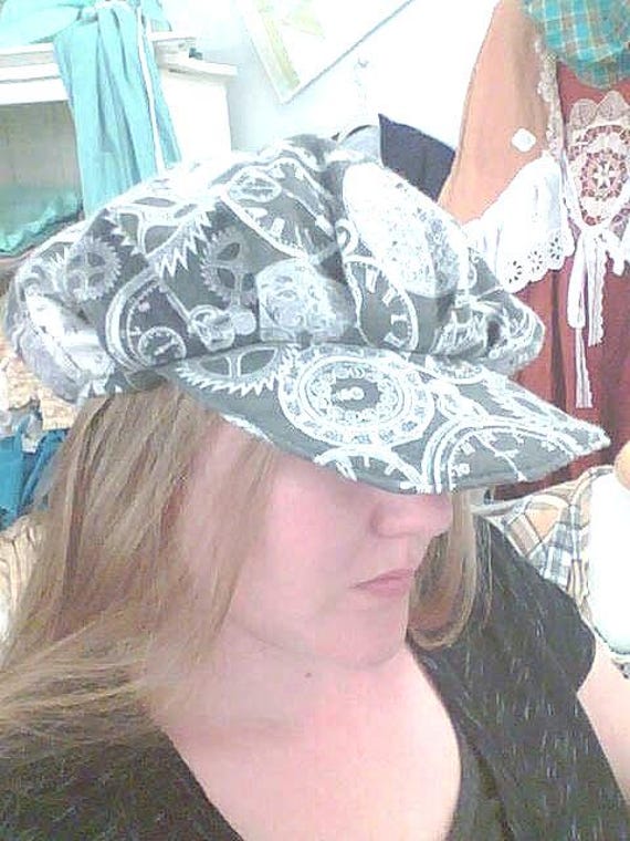 Slouchy flannel clock and gear hat with brim