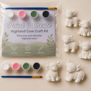 May include: A Highland Cow craft kit in a clear plastic bag containing six unpainted white ceramic cow figurines, four small pots of paint in white, pink, green, and black, and one blue paintbrush. The packaging features the text Paint & Create.