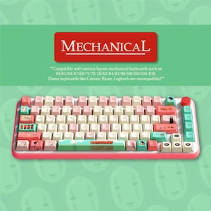 May include: A pink mechanical keyboard with custom keycaps. The keycaps feature a variety of colors including pink, white, and teal, with illustrations of characters and scenes. The keyboard has a red accent button and the word "MECHANICAL" in a red rectangle.