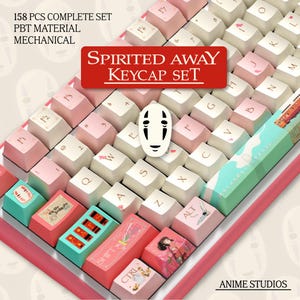 May include: A complete mechanical keyboard keycap set featuring a "Spirited Away" theme. The set includes 158 PBT material keycaps in pink, white, and teal colors. The keycaps have various designs and text, including the words "Spirited Away" and "Anime Studios".