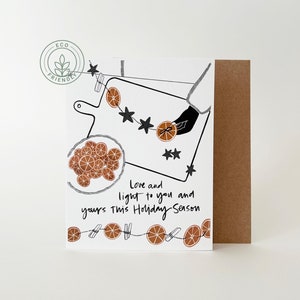 Kerstkaart | Origineel kunstwerk | Persoon die een sinaasappelslinger maakt | Winterzonnewende | Milieuvriendelijke materialen