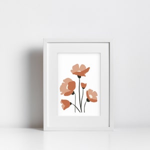 May include: A framed art print featuring a minimalist floral design. The artwork showcases stylized peach-colored flowers with black stems against a white background. The print is encased in a white frame, suitable for home decor.