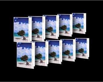 May include: A collection of ten rectangular art prints featuring a scenic beach landscape with a distinctive tree. The prints showcase a vibrant blue sky with fluffy white clouds, turquoise water, and a sandy beach.