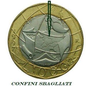 May include: A gold and silver coin featuring a map design and the text "CONFINI SBAGLIATI" at the bottom. The coin has a gold outer ring and a silver centre with a world map.