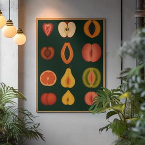 May include: A framed art print featuring a dark green background with illustrations of various sliced fruits. The fruits include a strawberry, apple, peach, papaya, grapefruit, pear, and kiwi. The artwork is displayed on a wall with plants.