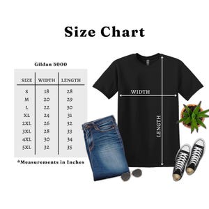 May include: Black t-shirt with a size chart, jeans, and sneakers. The size chart shows measurements in inches for Gildan 5000 shirts, ranging from 18" width and 28" length to 32" width and 35" length.