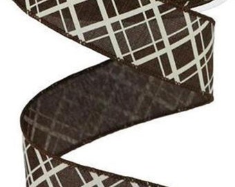 May include: Brown and white plaid ribbon with a geometric pattern. The ribbon is 2.5 inches wide.