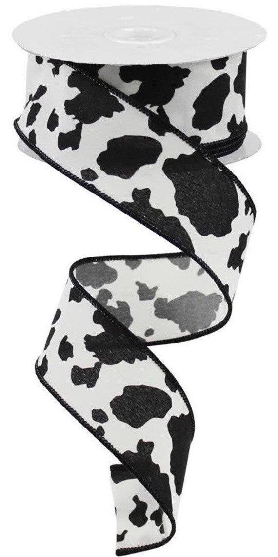 Cow pattern ribbon printed in black and white on 1.5 white single