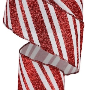 May include: Red and white striped ribbon with glitter. The ribbon is 2.5 inches wide and has a wired edge.