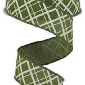 May include: Green and white patterned ribbon with a diamond design. The ribbon is 2.5 inches wide.