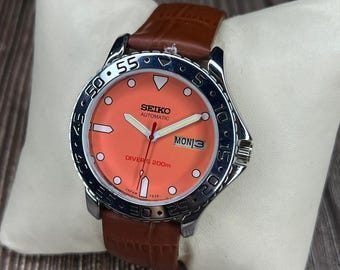 Vintage Seiko 5 Automatic Day-Date Orange colour dial, refurbished Men's wrist Watch made Japan