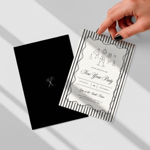 Printable New Years Eve invitation with coordinating black envelope, elegant party stationery