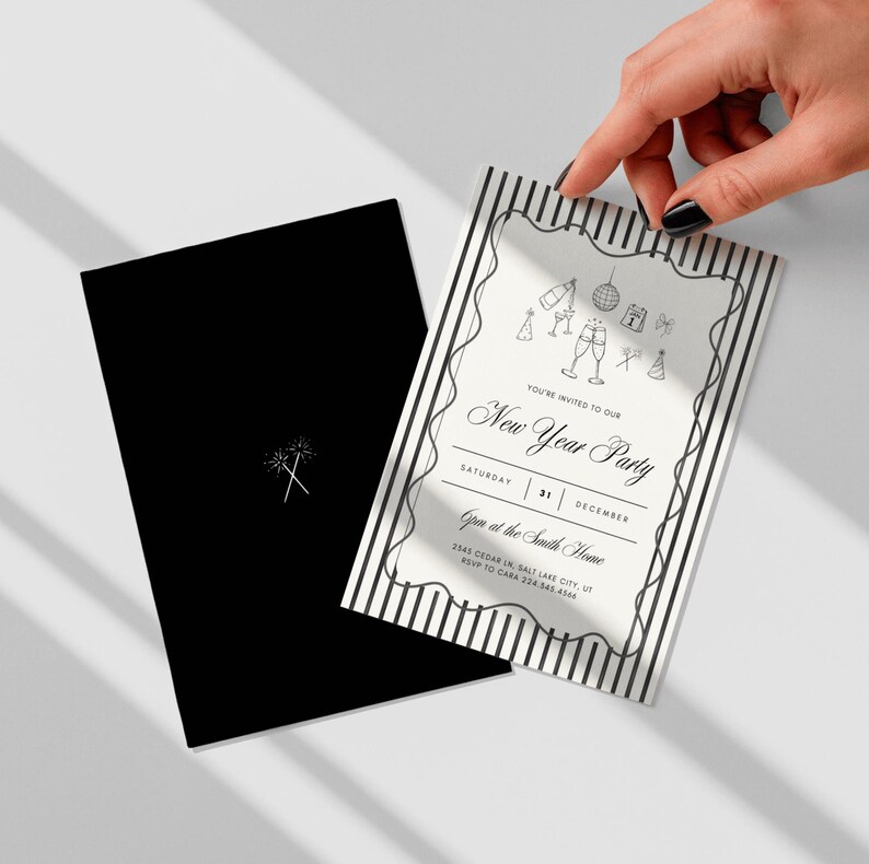 Printable New Years Eve invitation with coordinating black envelope, elegant party stationery