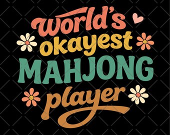 May include: A retro-style graphic on a black background reads "World's okayest Mahjong player" in orange, yellow, and teal. The design includes floral accents and a small pink heart, perfect for Mahjong enthusiasts.